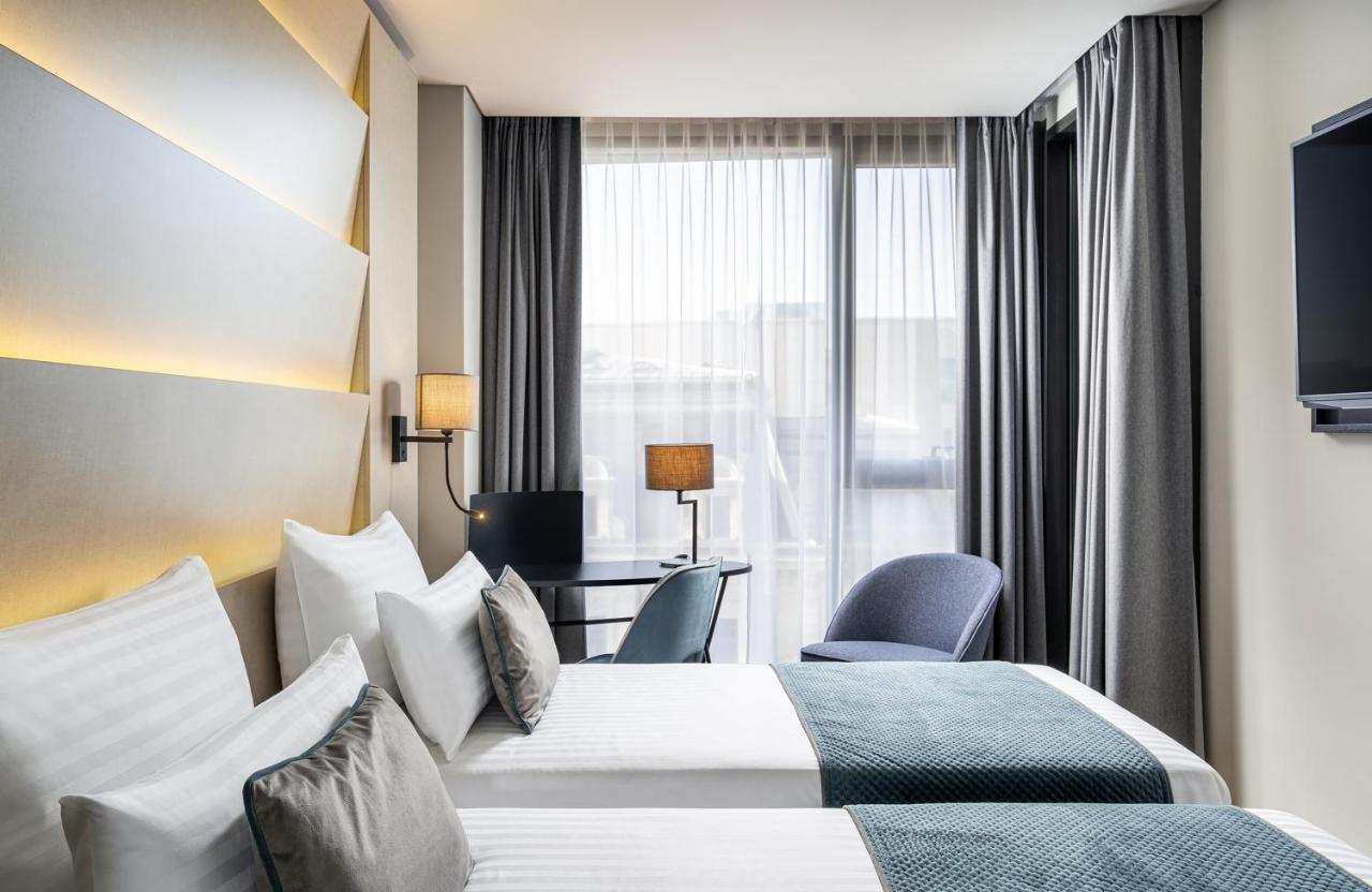 Leonardo Hotel Bucharest City Center Bagian luar foto